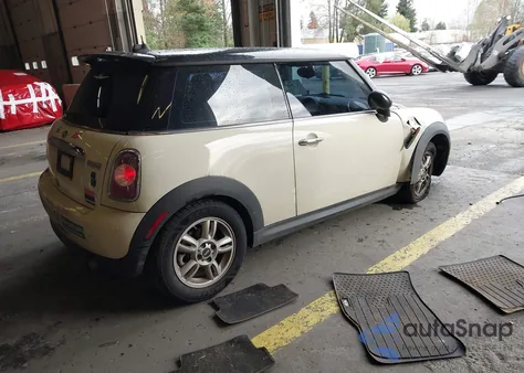2012 Mini Cooper z USA, uszkodzony, nr VIN WMWSU3C51CT542746